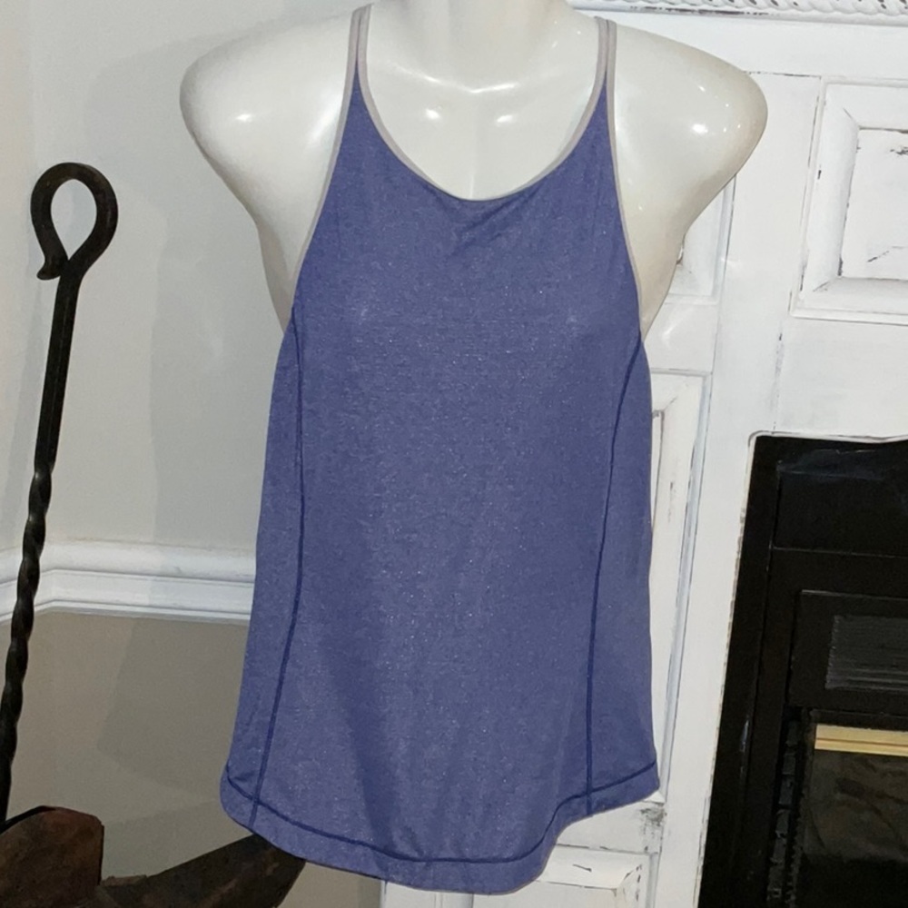 Lululemon tank top is a shimmery bluish purple color size 2